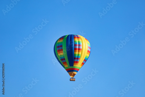 A bright colorful hot air balloon with clear blue sky in Temecula, California.