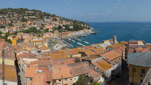 Aerial View of Porto Santo Stefano Harbor with Boats and Coastal Village in Tuscany, Italy