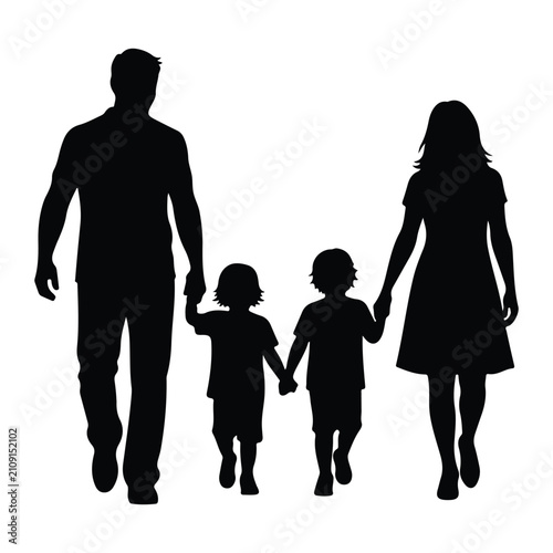 Silhouette of parents walking with two children, holding hands