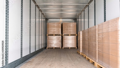 Interior View of Semi Trailer with Organized Cargo Pallets Provides Professional Logistic Solutions for Commercial Distribution and Freight Transportation Industry