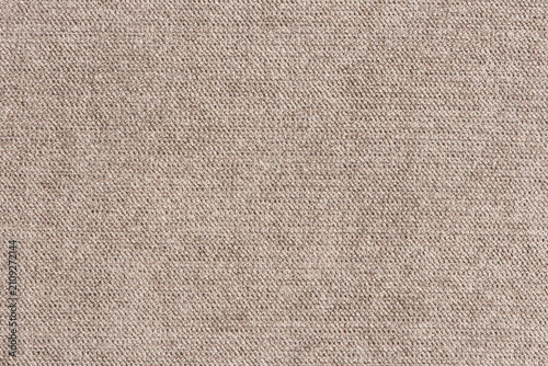 Beige woven carpet texture background with copy space. Minimalist textile surface banner featuring tight fabric loops.