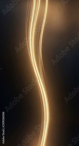 Abstract Golden Light Streaks Flowing on Dark Background.