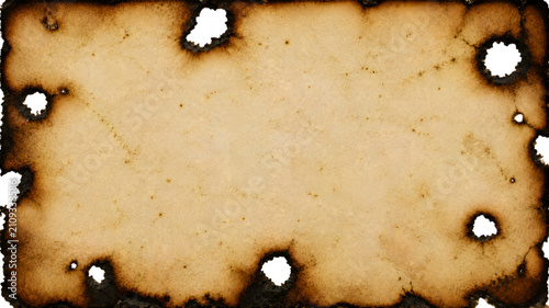 Burned paper texture with irregular holes a distressed and aged parchment style background ancient artifact beige blemish brown burn burning