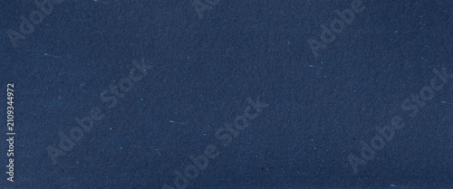 empty textured pattern background design for craft projects  - Abstract organic dark blue handmade paper cardboard craft paper texture with recycled inclusions, subtle fiber and small colorful flecks