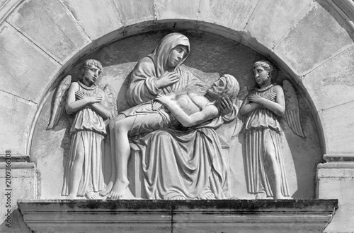 Pietrasanta - The medieval marble relief of Pieta - Deposition on the facade ...