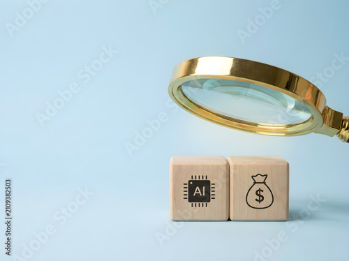 Magnifying glass over wooden blocks with artificial intelligence and money bag symbols