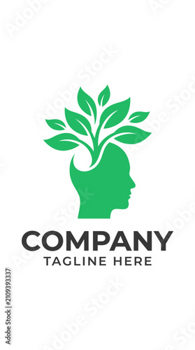 Green human head silhouette with growing tree leaves
