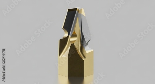 Close-up of a metal drill bit, gold and silver finish, macro photography