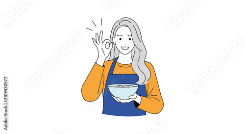 Happy female chef in a blue apron holding a fresh bowl of hot noodles and showing a positive OK hand sign.