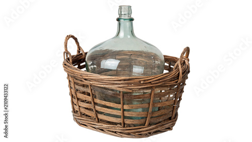 Bild auf Leinwand Large empty white glass carboy bottle inside wicker basket isolated on transpare