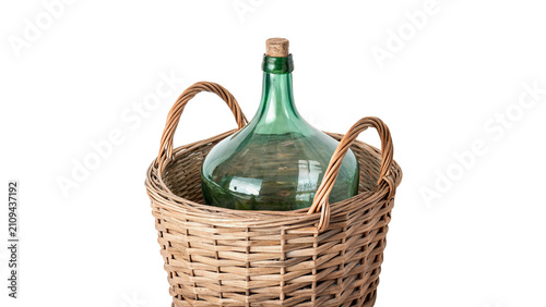 Quadro su tela Large empty white glass carboy bottle inside wicker basket isolated on transpare