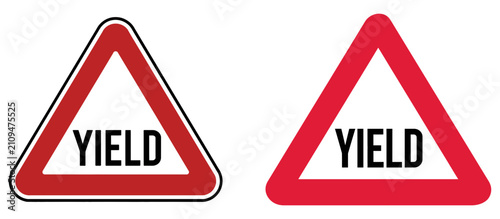 Yield signs featuring bold red triangles and clear black typography indicate traffic safety and road rules.
