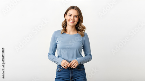 Young woman in blue top smiling.