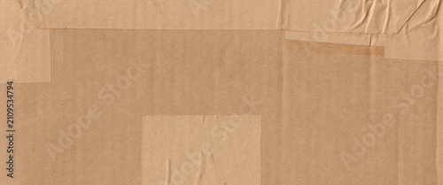 Frame made of brown beige old paper with packet tape, cardboard carton packag...