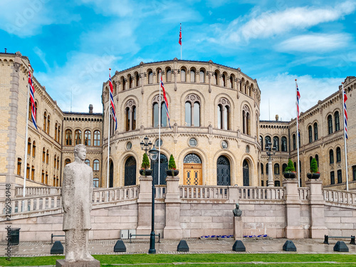 Norwegian Parliament with flags and sculptures