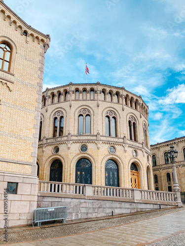 curved facade of the Norwegian Parliament in Oslo