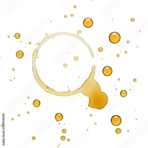 A close-up macro of a translucent white wine glass ring stain with imperfect edges and scattered splatters on a transparent background, showcasing liquid texture concept of elegant simplicity
