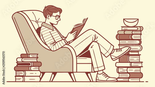 Young man reading a book in armchair surrounded by stacks of books, education and knowledge concept for international literacy day