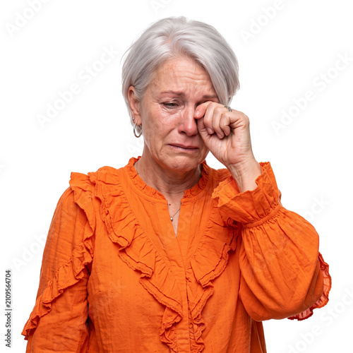 Sad Elderly Woman Crying, Wiping Tears, Emotional Distress, Isolated on White