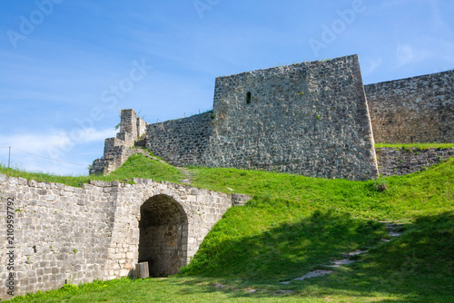 Ancient stone walls and arc...