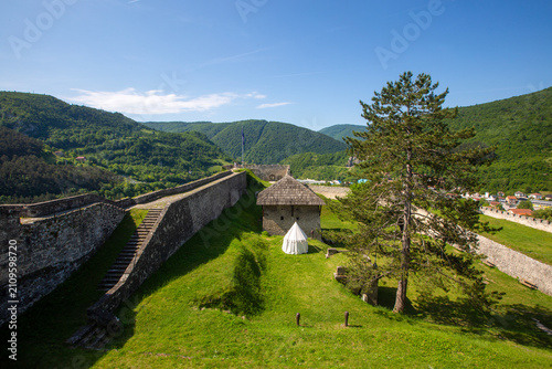 Ancient stone walls and arc...