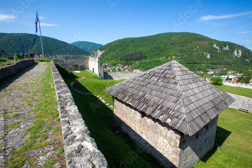 Ancient stone walls and arc...