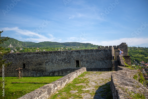 Ancient stone walls and arc...