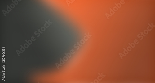 Foto A smooth abstract background featuring a gradient blend of vibrant orange and dark grey colors