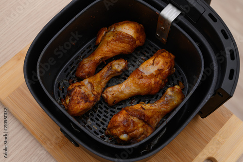 Delicious and juicy golden roasted chicken drumsticks baked in an air fryer
