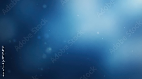 Abstract blue background with soft glowing bokeh light particles abstract background particles gradient backdrop wallpaper atmosphere minimalist corporate creative template