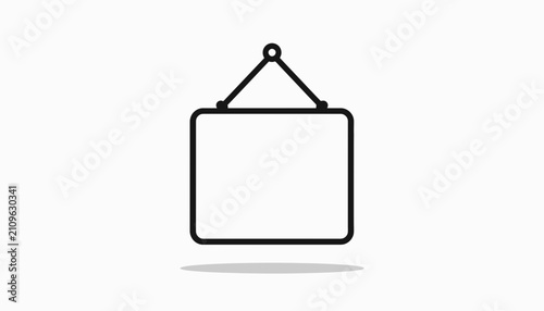 Фотография Blank sign hanging from string.