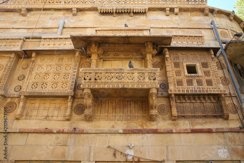 Jaisalmer city nicknamed The Golden City in Rajasthan, India. Indian architecture, architectural Rajasthani landmark, sight. Beautiful ornamental facade, exterior detail. Building, decor
