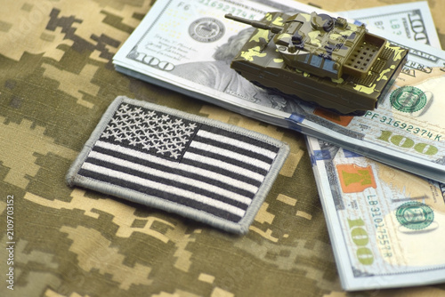 Military equipment on the hundred dollar bill. The history of war financing and military support