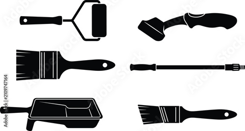 Set of black silhouettes of painting and renovation tools including paintbrushes and rollers for home improvement design