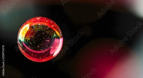 Colorful Soap Bubble Macro with Abstract Bokeh Background