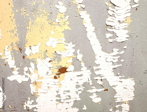 Konstfotografi White cracked Paint peels from grey Concrete Wall, revealing yellow, beige and brown layers