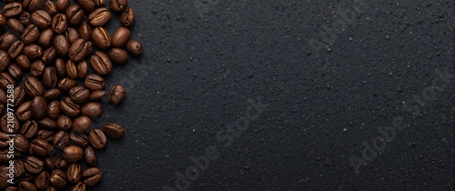 Coffee beans on a dark textured background
