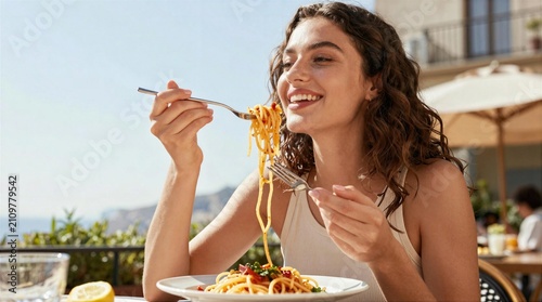 Enjoying spaghetti at a sunny restaurant in the afternoon with friends