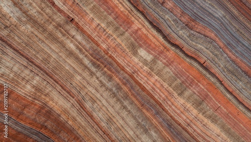 Colorful Natural Stone Surface with Striations and Layers