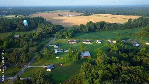 Morning sunlight on Tennessee rural countryside farmland and homes 