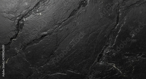Black Marble Surface with Natural Veins and Texture