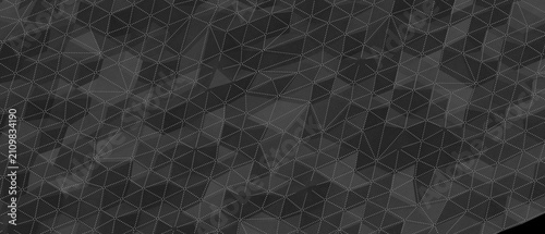 Obraz na płótnie Dark abstract geometric pattern of interconnected triangles with subtle texture.