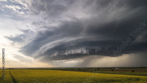 Massive Supercell Thunderstorm Developing Above Agricultural Landscape Illustrating Extreme Weather and Atmospheric Instability