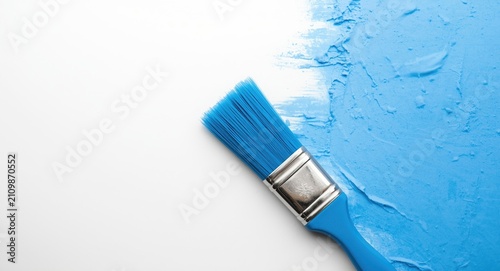 Blue Paint Brush Resting on...