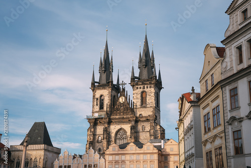 Cuadro en lienzo Ornate gothic architecture with iconic spires rising above historic buildings in