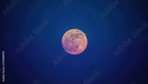 Full Moon Glowing in a Dark...
