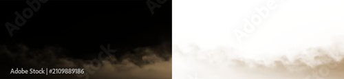 Foto Brown smoke rises on a transparent background during a late afternoon breeze at