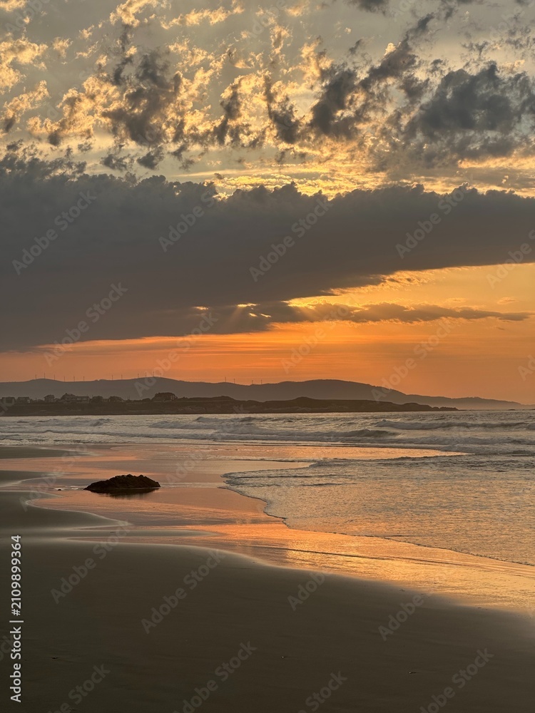 Fototapeta premium Sunset on As Catedrais Beach in Galicia, Spain