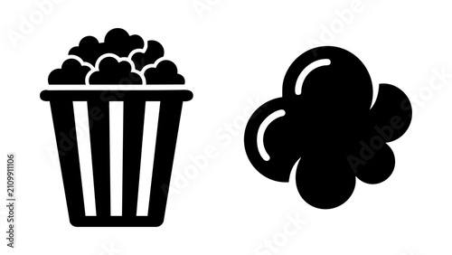Black popcorn bucket and kernel icons for cinema snacks
