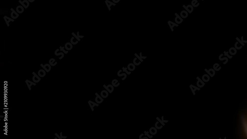 dark abstract background with bokeh lights, soft focus lens flare effect, atmospheric mood for creative design projects